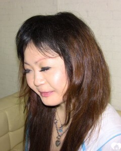 Stunning Asian gets completely naked on camera