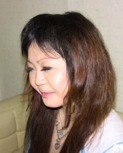 Stunning Asian gets completely naked on camera