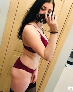 Thick beauty posing in some black stockings