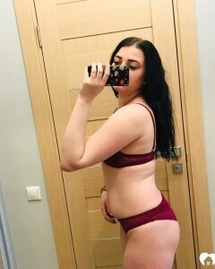 Thick beauty posing in some black stockings