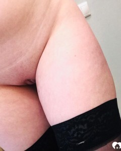 Thick beauty posing in some black stockings