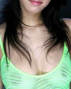 Maria Ozawa teasing in her mini green skirt