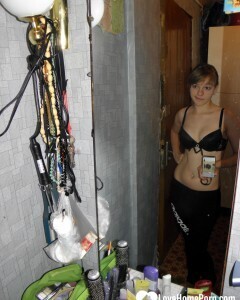 Petite teen slowly strips off her clothes