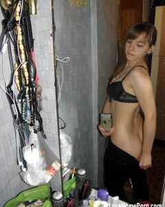 Petite teen slowly strips off her clothes