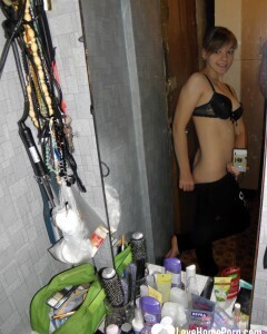 Petite teen slowly strips off her clothes