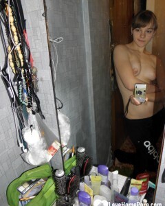 Petite teen slowly strips off her clothes