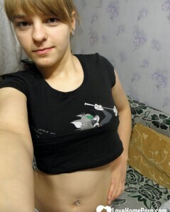 Petite teen slowly strips off her clothes