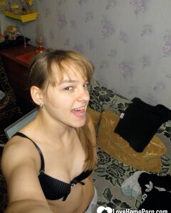 Petite teen slowly strips off her clothes