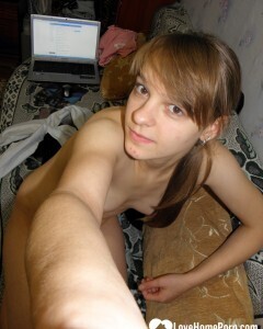 Petite teen slowly strips off her clothes