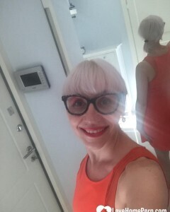 Blonde MILF with glasses teasing with nudes