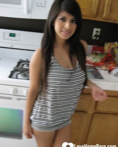 Busty cutie spreads her pussy lips wide