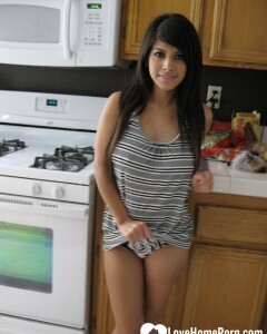 Busty cutie spreads her pussy lips wide