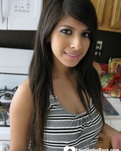 Busty cutie spreads her pussy lips wide