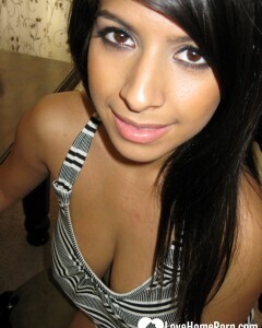 Busty cutie spreads her pussy lips wide