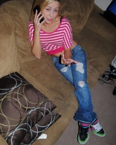 Blonde hottie strips before rubbing her pussy.