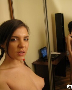 Busty teen gives a peak of her ass