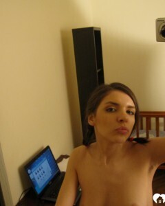 Busty teen gives a peak of her ass