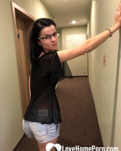 Some risky teasing in the hotel hallway