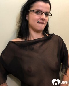 Some risky teasing in the hotel hallway