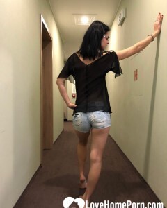 Some risky teasing in the hotel hallway