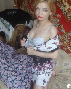 Luscious beauty with an ass tattoo fooling around