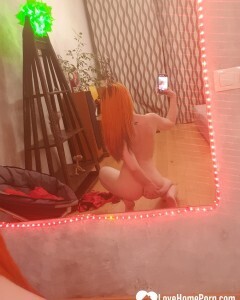 Extraordinary redhead knows how to do naughty poses