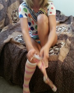 Babe with cute socks shows her dildo skills