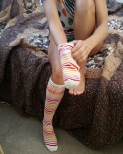 Babe with cute socks shows her dildo skills