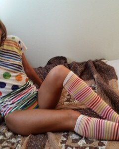 Babe with cute socks shows her dildo skills