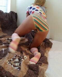 Babe with cute socks shows her dildo skills