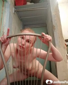 Stunning babe taking some selfies on a chair