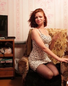 Redhead babe in stockings wants a hard cock