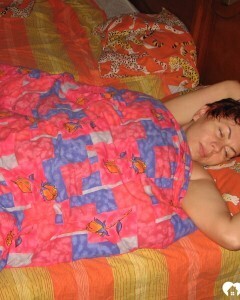 Redhead MILF pisses and takes a shower