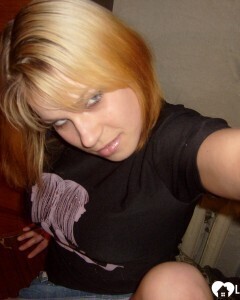 Blonde posing naked by the CTR monitor