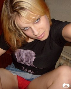 Blonde posing naked by the CTR monitor