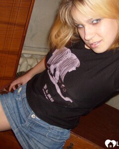 Blonde posing naked by the CTR monitor