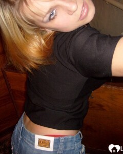 Blonde posing naked by the CTR monitor