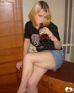 Blonde posing naked by the CTR monitor