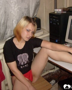 Blonde posing naked by the CTR monitor