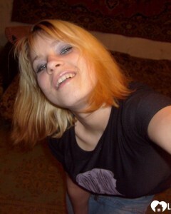 Blonde posing naked by the CTR monitor