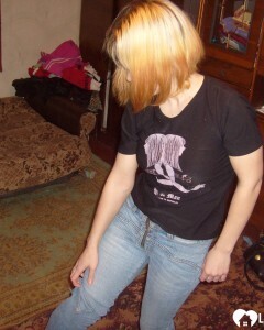 Blonde posing naked by the CTR monitor