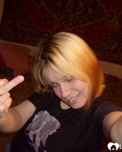 Blonde posing naked by the CTR monitor